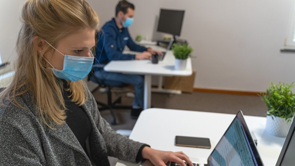 Woman Screener Wearing Mask