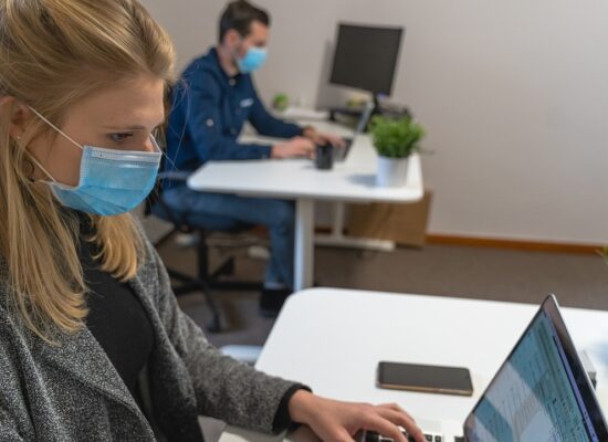 Woman Screener Wearing Mask