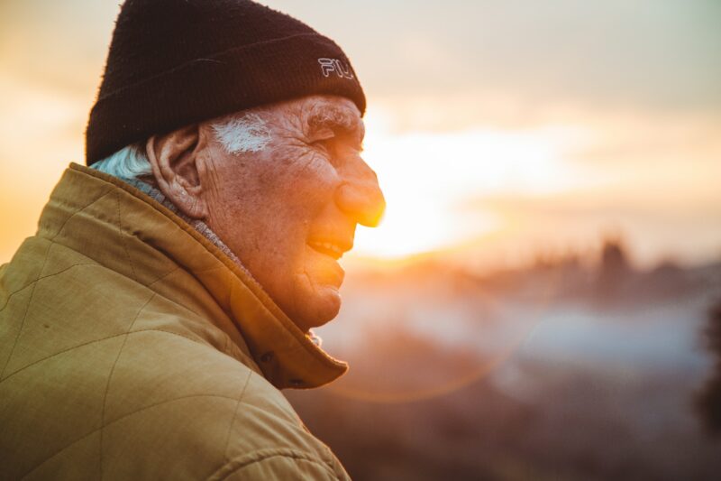 Elderly Man Thinking In Sun