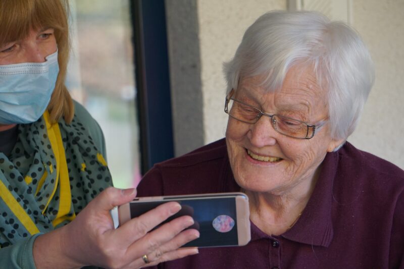 Care Worker And Elderly Woman