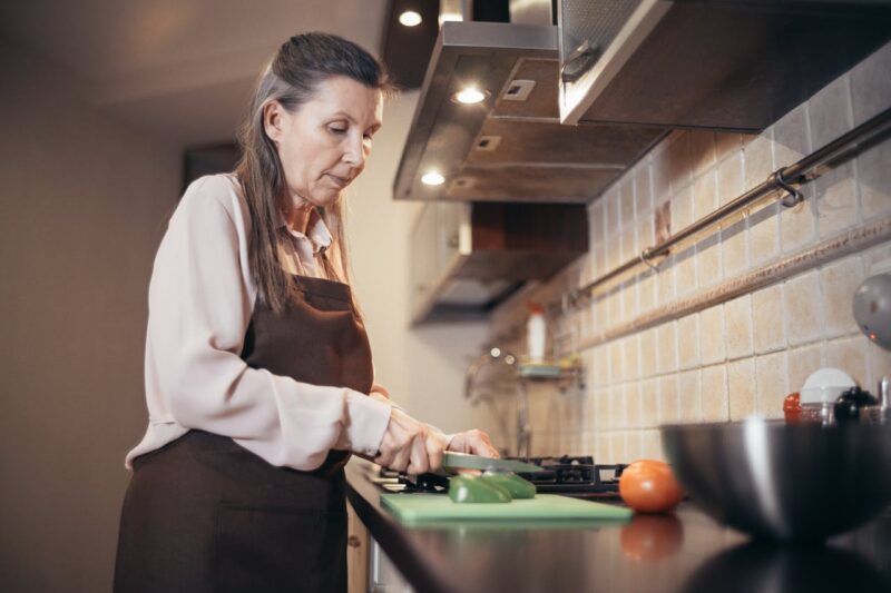 Woman Cooking Vegetables
